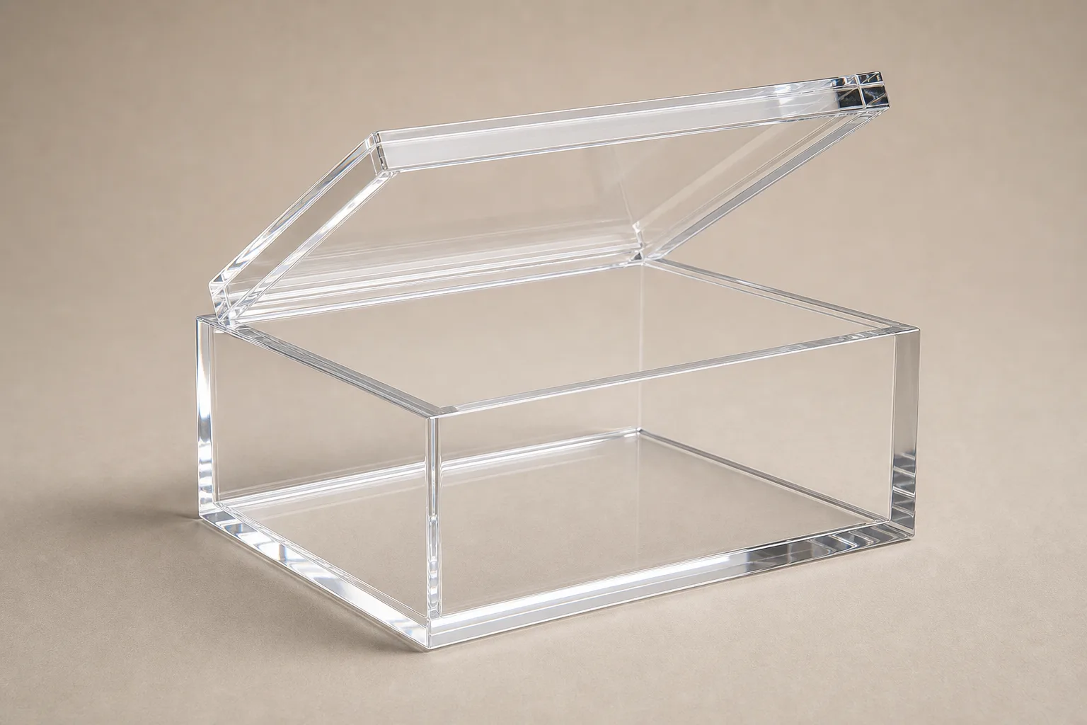 Clear acrylic display box with a recessed lip lid partially lifted, showing the machined PMMA seating edge that forms the dust seal